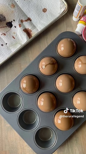 Do not sleep on this tutorial! These stunning amber glass ornaments are so easy to make and can be customized to your own style! See the full tutorial here: https://www.therurallegend.com/post/diy-tinted-glass-ornaments #trlchristmas #thriftedchristmas #christmasdecorating #diyornaments