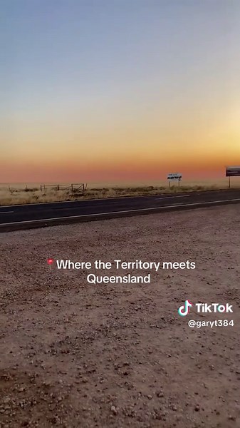 Exploring Outback Australia: Trucks at Sunset