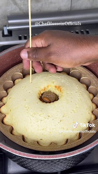 Let’s Make Sponge Vanilla Cake😋😋🔥 (Without Oven) Ingredients You’ll Need: I will start pre heating the pot for 20 minutes 2 cups of salt (you can use sand) 4 eggs 1 cup of sugar Beat for 10 minutes until creamy Half cup of milk Half cup of vegetable cooking oil 1tbsp vanilla essence 2 cups of all purpose flour 1tsp of baking powder Sieve the flour to avoid lumps Tap to remove the excess bubbles Set your time at 55 minutes For the custard filling you’ll need: 2 cups of milk 2 tbsp of sugar 2tb