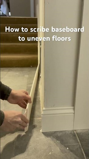 How to scribe baseboard on uneven floors #carpenter #remodeling #diy #carpentry