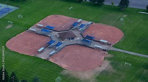 Aerial Springville Utah urban recreation baseball fields. Central Utah city rapidly growing population, homes, business and schools. Neighborhood parks and recreation fields.