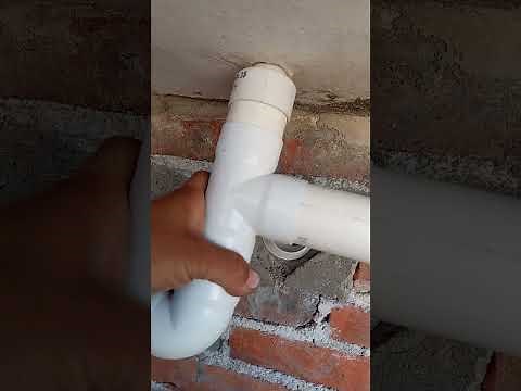 Installation of 2-inch PVC pipe to a laundry sink