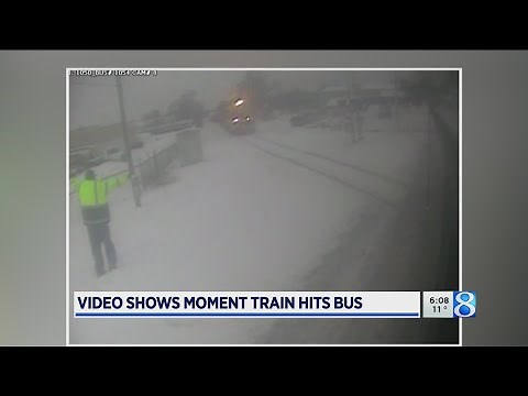 Video shows moment train hits bus