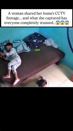 Scary_Encounter5 on Instagram: "A woman shared CCTV footage from inside her home, and it has shocked thousands online. The video shows a terrifying moment when two of her children were inside their room. The older brother was using his phone, while the younger girl was watching TV. Suddenly, the little girl seemed to be pulled under the bed by an unseen force. She cried in fear, and her brother—whose leg was swollen—couldn’t help her. He immediately shouted for help. Their grandmother rushed in 