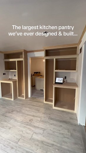 Talk about pantry goals! This walk-in kitchen pantry is actually massive😅 and it was for one of very own Kadilak team members, Dave! We renovated his entire kitchen and living area, so make sure to check out the full tour on our YouTube channel. #kitchenpantrygoals #walkinpantry #bigpantry #pantrygoals #kitchenorganization #builtinstorage