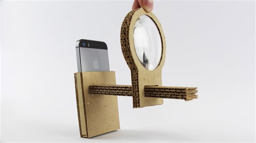 DIY smartphone projector: Transform your flashlight with cardboard & a magnifying lens!