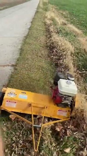 Mott flail mower mowing side ditch
