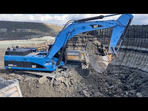 Caterpillar 345C Excavator Loading Trucks