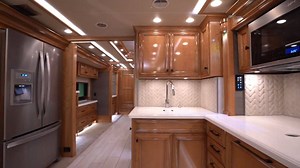 The abundant living space in our 2021 #AllegroBus 35 CP is home to four HDTVs, an exceptional sound system, an integrated Spyder® Multiplex System, and handcrafted cabinetry throughout. Learn more: https://fal.cn/38dOI. | Tiffin Motorhomes