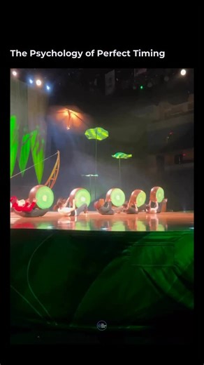 The Shared Mind on Instagram: "In a scene from Cirque du Soleil’s show OVO, performers lie on their backs, synchronizing precise foot movements to keep large spherical props in motion. The action appears playful, almost effortless. In reality, it requires extreme coordination, timing, and trust. Psychologically, the moment works because the brain is highly sensitive to synchrony. When multiple bodies move in perfect rhythm, viewers experience a sense of harmony and collective control. The repeti