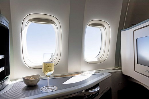 The Main Differences Between Business Class vs. First Class—and Tips for Booking Each