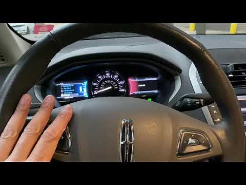 Lincoln MKZ - How to adjust the steering wheel height