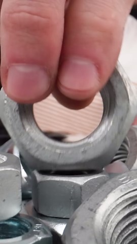 Building a bicycle frame from hundreds of metal nuts – unique DIY bike project!