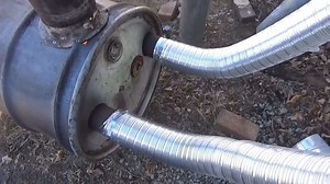 How to heat your garage the Inexpensive way by building an Outdoor Stove with Heat Exchanger