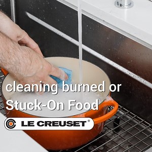 SAVE this post for tips on cleaning tough stains or burned food on your #LeCreuset cast iron. 🧽 Check out our suggestions below, and visit our website for more details: https://bit.ly/2XFlQh0. - Our long-lasting enamel cleans easily with warm water and a soapy sponge - no need for the seasoning and upkeep of raw cast iron. - For burned food on the inside of the pot, try simmering baking soda and water as shown in this video. Our Cast Iron Cleaner (https://bit.ly/31Tx6HH) or a paste of baking so