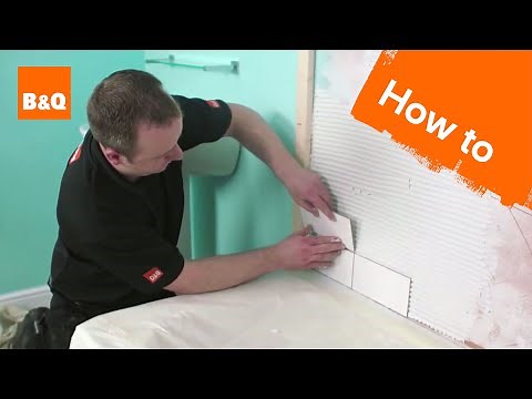 How to tile a bath splashback part 2: fixing the tiles