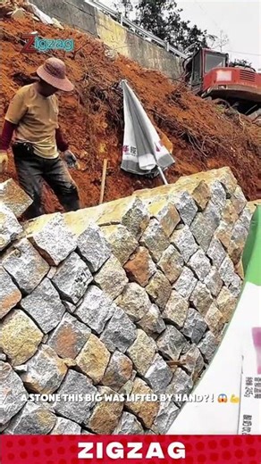 Hand - Built Stone Retaining Wall for Erosion Control and Landscaping