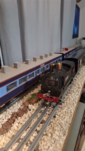 nw2 switcher in NDeM colors with FNM excursion cars. #ogauge #oscale #ndem #fnm