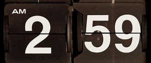 Download Retro flip clock changing from 02:59 am to 03:00 am in 4K for free