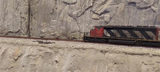 The Canadian Central by Anton Mazza. Just wow. This HO scale basement layout is sizeable, and it includes something I've never seen before: rockslide sheds along the mainline. The sheds are made from styrene and the rockface is sculpted hydrocal. It's incredible! From today's Mainline Hobby Supply layout tours! | Reading and Lehigh Railroad, N scale