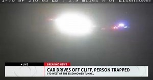 Car drives off cliff, 1 person reportedly trapped