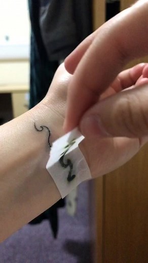 DIY Temporary Tattoo Using Perfume, Water, and a Marker