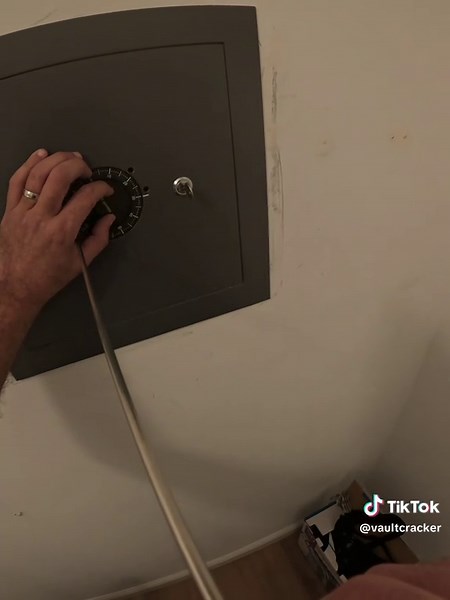 Part 2: previous owner passed away, 8 years later the new owner decided to get the wall Safe opened. Watch to see what’s inside. #8years #mystery #wallsafe #part2