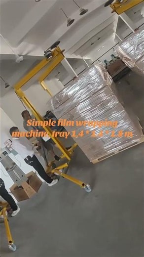 A simple film wrapping machine, a tray baling machine,