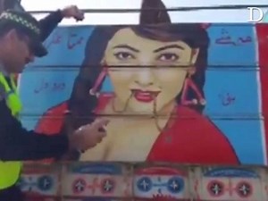 Some traffic wardens in Khyber Pakhtunkhwa were recently captured on camera flagging down trucks and vandalising “immoral” paintings. | Dawn.com