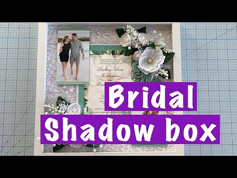 DIY this wedding shadow box with photos and invitation