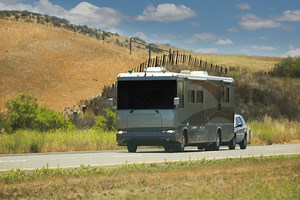Methods for Towing a Car Behind an RV: Flat Towing, Tow Dollies, and Trailers