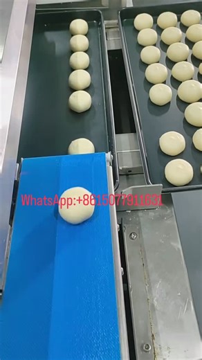 Summer Tong on Instagram: "Automatic bread tray loader machine #bun maker machine #tray arrangement machine"