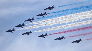 Military flyover spreads red, white and blue over the Hudson
