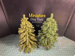 Miniature easy DIY project making a faux landscaping or Christmas tree from artificial pine garland