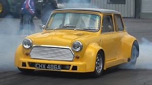 It's been a few years since the Garage26 Austin Mini has been down the strip so it was good to see it back earlier in the year at The Best of British Show! Powered by a 441ci Twin Turbo Brodix Small Block Chevy, 3 speed transmission and narrowed Ford 9" rear axle. The early runs it was running just 6psi of boost before turning it up to 10psi but the traction just wasn't there as you can see! | Mk1Kieran