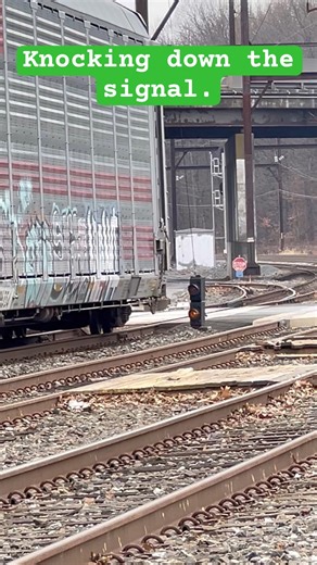 Trains at railroad crossings. Knocking down the dwarf signal at Woodbourne.