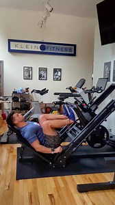 The ultimate lower body strength training machine combines leg press, hack squat, forward thrust, and calf raises. Unleash your inner Titan with the Plate-Loaded Leg Press and Hack Squat Machine. Explicitly designed to develop glutes, quads, calves, hamstrings, and core abdominal muscles in one freestanding machine. This lower-body strength training machine, constructed from durable steel, features large diamond-plated footplates, comfortable support padding for the lower back and shoulder areas