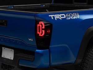 Raxiom Tacoma XW Series Sequential LED Tail Lights; Black Housing, Smoked Lens TT30330 (16-23 Tacoma) - Free Shipping
