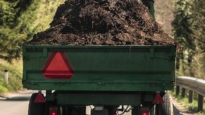 ‘Only in France’: Farmers spray manure at government offices in protest