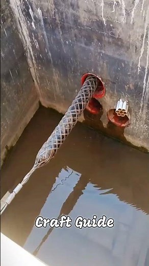 The process of pulling a power cable through an underground manhole