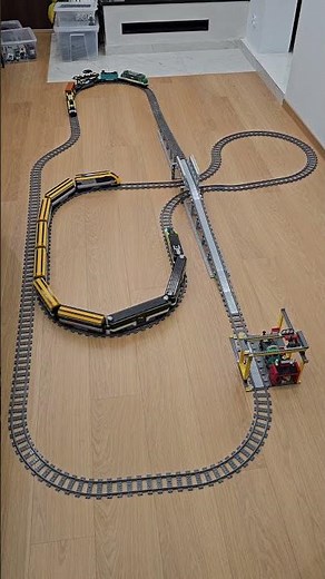 Two fast LEGO trains on separate bridge and underbridge loops