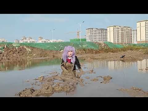 Uniform with black leather shoes playing in the mud
