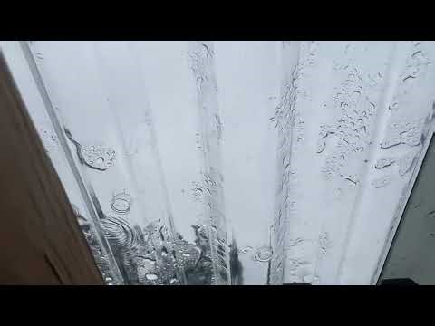 Suntuf 2.2 x 8 polycarbonate roof panels in the rain