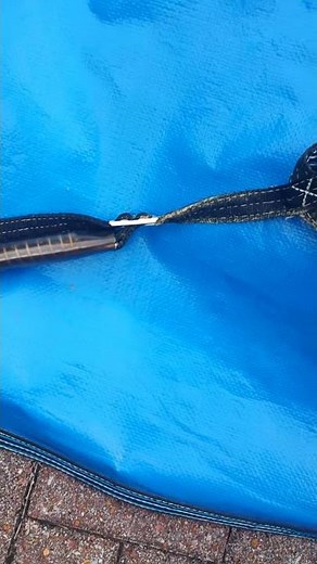 Pool cover buckle installation.