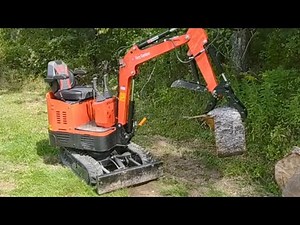 How to install a light weight log grapple on a Groundhog Mini Excavator