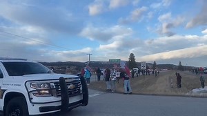 Hundreds of people lined Highway 2 from Glacier International Airport to Kila School to welcome home the Bench family after the passing of their son 9-year-old Maverick Bench from a rare condition. A hundred or so police cars and fire trucks and a helicopter escorted the family home. Maverick's ashes were in the passenger seat of a fire truck with his family. | NBC Montana