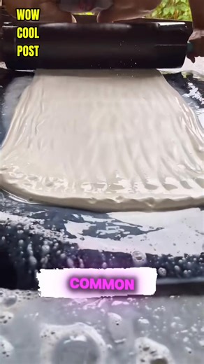 The Incredible Journey of Natural Rubber! 🌳🛠️ Watch the fascinating process of natural rubber production, from the milky liquid collected from rubber trees to the solid sheets used for products like tires and car mats! This incredible local process in Thailand is a profitable and common trade. See how they use acid to solidify the latex, press out the moisture, and dry the sheets until they turn that iconic yellow color. It's truly amazing to see raw material transformation! #NaturalRubber #Ru