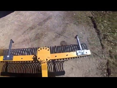 POV Video of Tractor Supply 6' Landscape Rake in Driveway Using the John Deere 2032R Tractor
