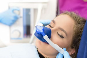 Laughing Gas: What It Is & How It Helps Relieve Pain