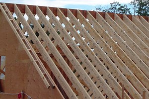Ridge board or ridge beam? Which one does my roof need?